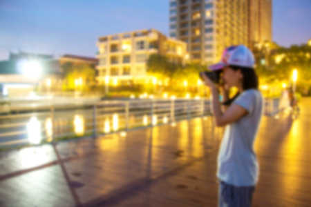 Asian young woman having photography funの写真素材