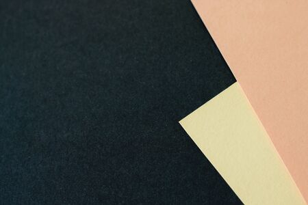 Abstract colorful paper on dark blue paper background.の写真素材