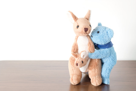 Teddy bear is hugging mommy kangaroo,Love modeの写真素材