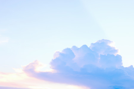 A soft sky with cloud background in pastel colorの写真素材