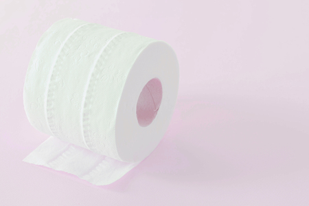 Tissue paper roll pink backgroundの写真素材