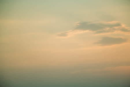 A soft sky with cloud background in pastel colorの写真素材