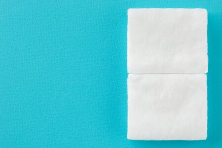 square cottons on blue background