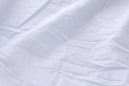 Texture of fabric is purple color background,Wavy folds of cloth.