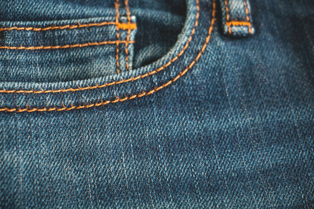 Blue jean background ,Denim with seam texture of fabric.の写真素材