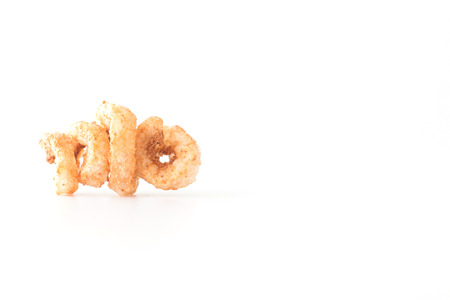 Crispy pork skin on white backgroundの写真素材