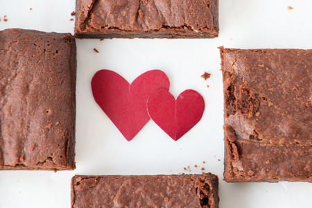 Homemade chocolate brownie with mini heart on Valentine's dayの写真素材