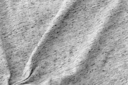 Creased grey cloth material as a backgroundの写真素材