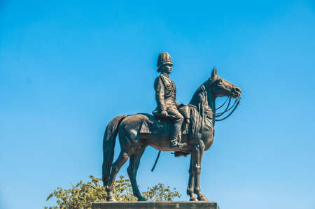 The equestrian statue of King Chulalongkorn (Rama V) with blue sky background in Bangkok, Thailand.の写真素材
