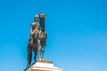 The equestrian statue of King Chulalongkorn (Rama V) with blue sky background in Bangkok, Thailand.の写真素材