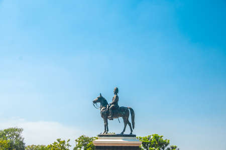 The equestrian statue of King Chulalongkorn (Rama V) with blue sky background in Bangkok, Thailand.の写真素材