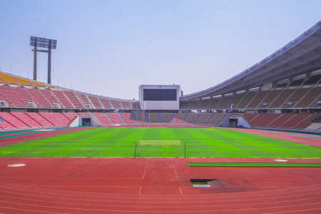 Rajamangala National Stadium ,Inside Football Stadium at Bangkok, Thailand with blue sky background