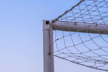 Football Net with blue sky backgroundの写真素材