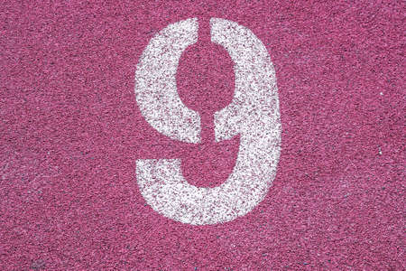 Number nine ninth 9 on the start of a running track - check my portfolio for other numbersの写真素材