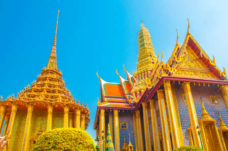 Wat Phra Kaew, Temple of the Emerald Buddha at Royal Grand Palace  with blue sky Background Bangkok, Asia Thailand.のeditorial素材