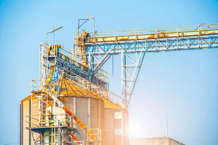 Industrial view at oil refinery plant form industry zone with blue sky and sunrise sky backgroundの写真素材