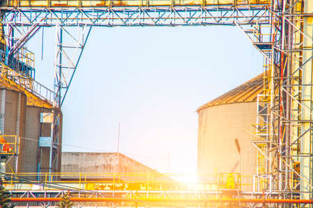 Close up Industrial view at oil refinery plant form industry zone with blue sky and sunrise sky backgroundの写真素材