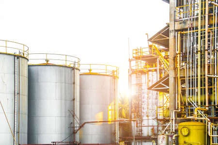 Industrial view at oil refinery plant form industry zone with sunrise sky backgroundの写真素材