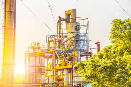 Close up Industrial view of pipelines and valves  at oil refinery plant form industry zone with sunrise sky backgroundの写真素材