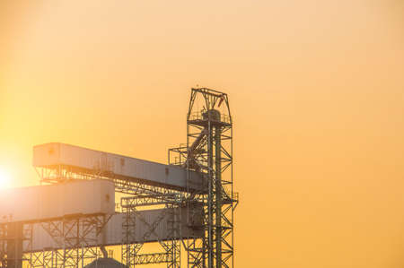 Industrial view at oil refinery plant form industry zone with sunrise sky backgroundの写真素材