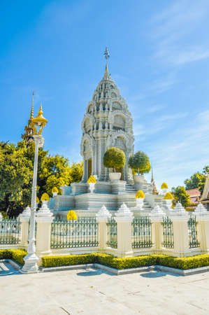 Phnom Penh tourist attraction and famouse landmark - Royal Palace ceremonial pagoda complex, Cambodia with blue sky backgroundの写真素材