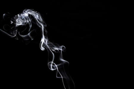 Movement of smoke,Abstract white smoke on black background.の写真素材