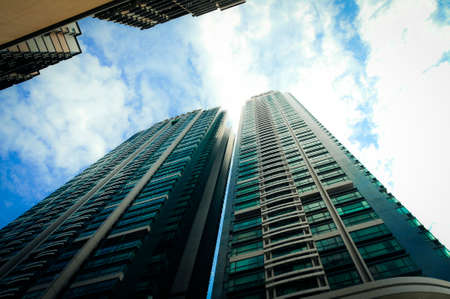 Landscape Modern business buildings with blue sky, shot in hong kong, asiaの写真素材