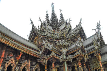 Beautiful view of famous Sanctuary of Truth, one of Thailand major tourist attractions and most visited castles in Asia, with Seaside and white sky background, Pattaya, Thailandの写真素材