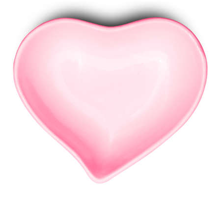 Empty red ceramic plate in shape of heart isolated on white background with clipping path. Can use for Valentines Day concept.の写真素材