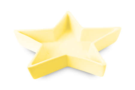 Empty yellow star shape  ceramics plate isolated on white background with clipping path.の写真素材