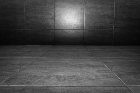 Close up black brick wall  texture with block  pattern, can be used as background for display or montage your products.の写真素材
