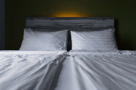 Close up Interior of white cozy bedroom in modern design.の写真素材