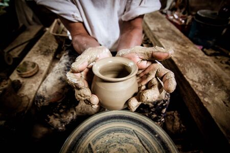Pottery clay by handの写真素材