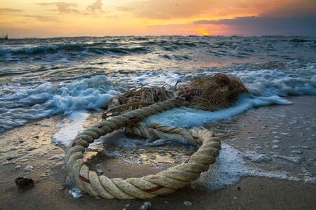 Sea waves at sunsetの写真素材