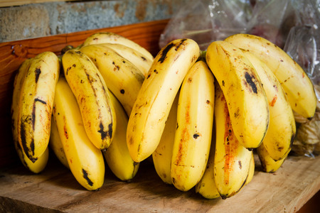 Yellow bananas taste sweetの写真素材