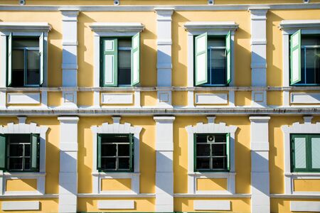 The windows of the yellow buildingの写真素材