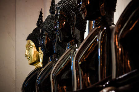 Buddha golden  face in a temple.の写真素材