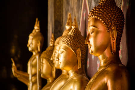 Golden Buddha in a temple thailand.の写真素材