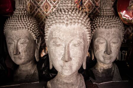 The large Buddha head in temple thailand.の写真素材