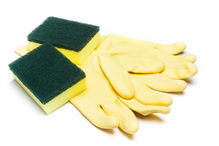 yellow rubber glove and cleaning sponge for cleaningの写真素材