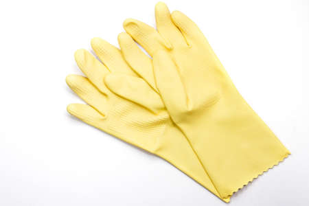 Yellow rubber gloves For cleaningの写真素材