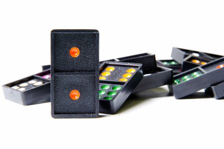 The colorful dominoes on the white background.
