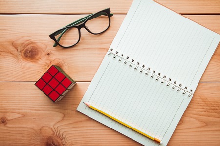 Book white paper on pine wooden tableの写真素材