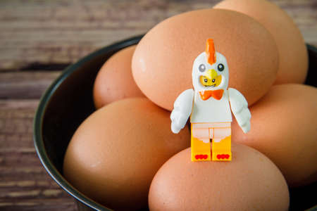 Lego Chicken Mascot on eggs. Legos are a popular line of plastic construction toys manufactured by The Lego Group, a company based in Denmark.の写真素材