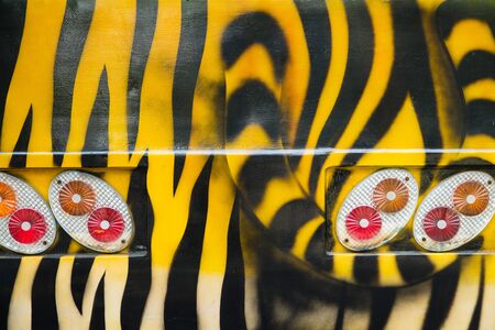 Bus tours in the zoo paint a tiger patterns.の写真素材