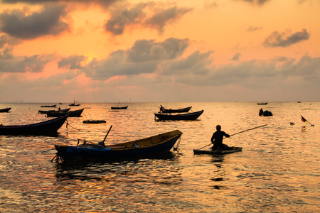 Fishing boats, small boats floating in the sea at sunrise, Concept sea in the morning.の写真素材