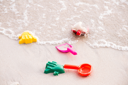 children's beach toys on the sand.の写真素材