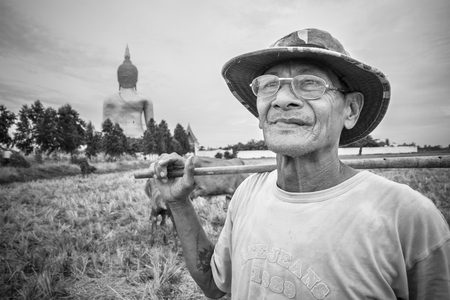 Angtong,Thailand, - July, 13, 2014 : Unidentified name old cattleman at backside Wat Muang Ang Thong, Thailand.Black and white pictureのeditorial素材
