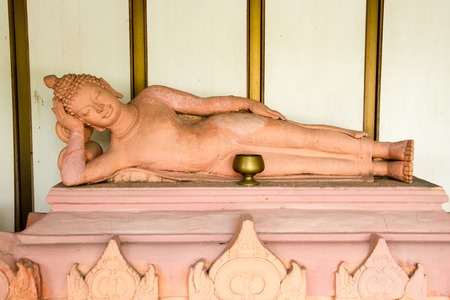 Sandstone Buddha statue in Thailand.の写真素材