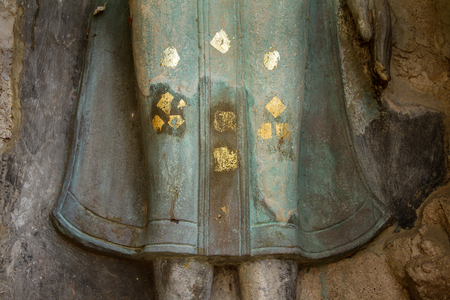 pieces of stones antique buddha and antique brick wall and pagoda of temple background fine art in Thailandの写真素材
